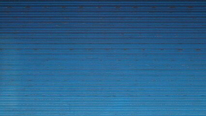 Old blue metal shutter door texture background
