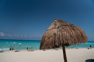 Straw Umbrella on Beach on Coast in Mexico - 691196879