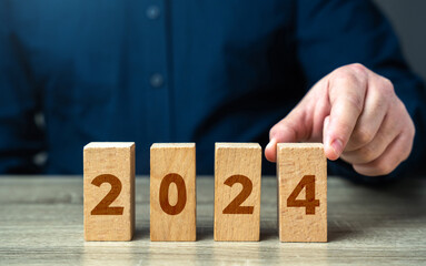 Setting up goal 2024 from blocks. Happy new year. Embracing new trends, making forecasts, setting...