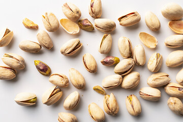 Close up of pistachios on white background, nuts, keto, healthy food