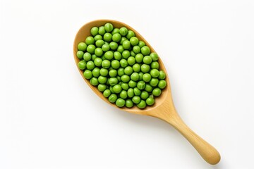 Top view of a wooden spoon with green peas isolated on a white background. Healthy vegetarian food, rich in protein and vitamins. Perfect for cooking, recipe or food related content. - Powered by Adobe
