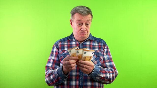 Man counting cash of 50 euro and angrily returns.