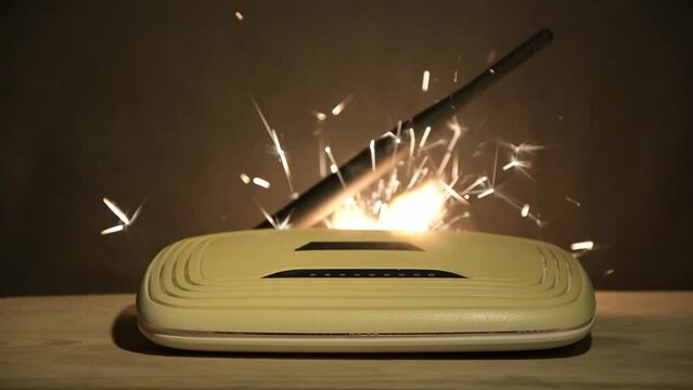 Wi-Fi router sparks and ignites from the load.
