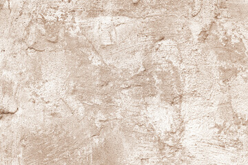 Vintage, old stucco plaster surface background, close up rough texture of brown and white mixed color painted cement, concrete wall texture. Wallpaper, backdrop, architecture design element