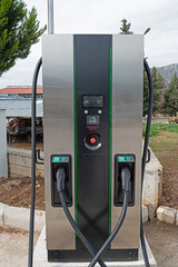 Electric vehicle filling station at the petrol station.