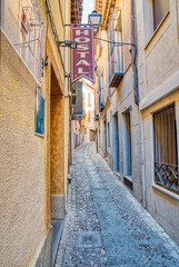 An old narrow street of historic Toledo, Spain