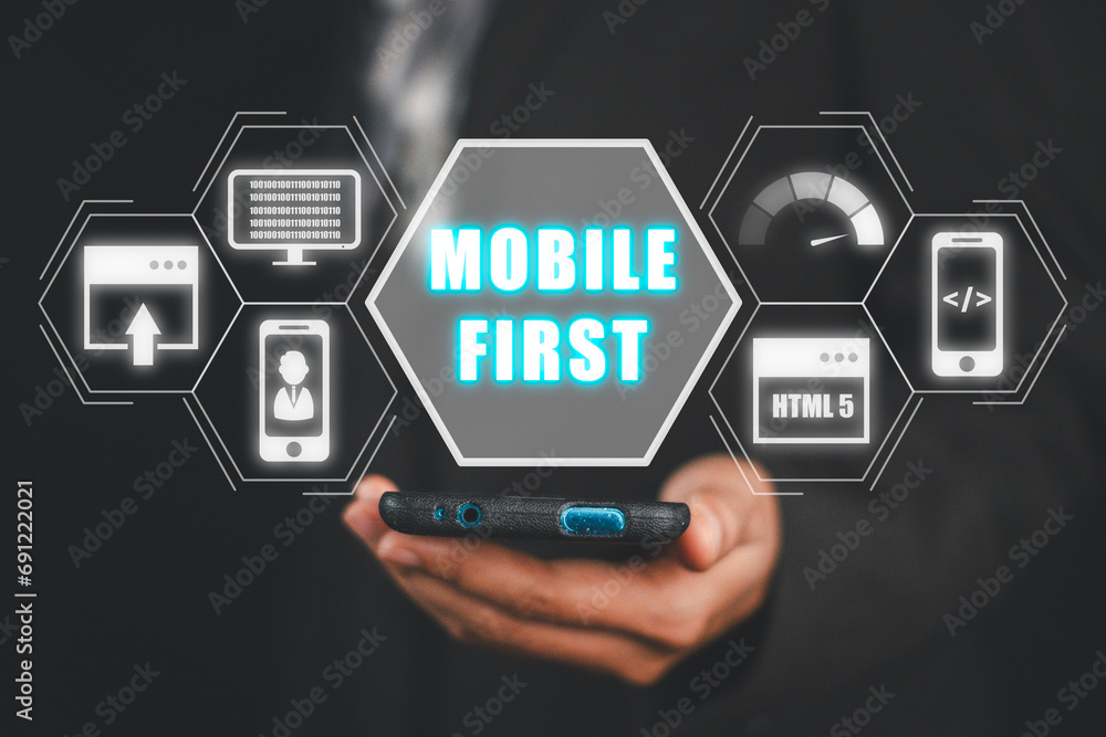 Poster mobile first concept, business woman using mobile phone with mobile first icon on virtual screen, we