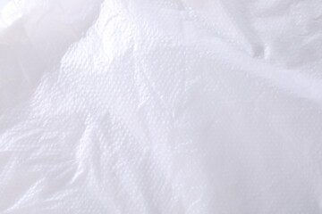 Texture of white plastic bag as background, closeup