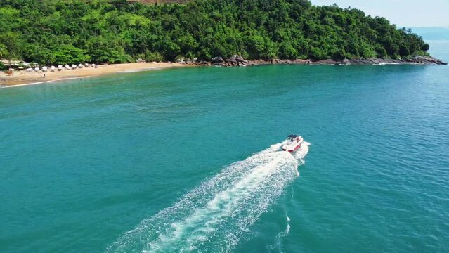 a boat near the beach in ilhabela in sao paulo state in brazil