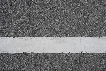 Fototapeta premium White lines in parking spaces in the park