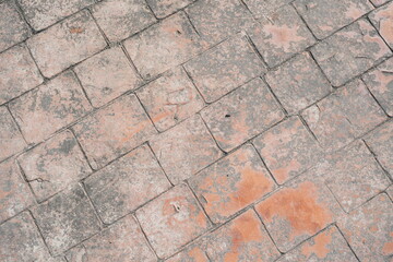 The old, peeling paint on the walkway in the park