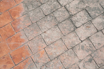 The old, peeling paint on the walkway in the park