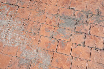 The old, peeling paint on the walkway in the park