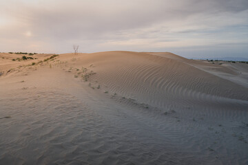 Sunset view of Sand dunes in XiangshaWan, or Singing sand Bay, China