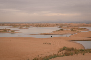 The river going through the desert in Wuhai, Inner Mongolia, China