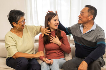 Portrait enjoy happy smiling love asian family.Senior mature father hug with elderly mother and...