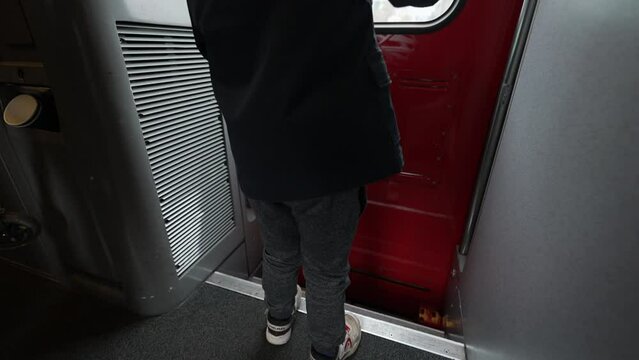 Mother And Child Exiting Train And Stepping Into Platform. Family Traveling By European High-speed Transportation, Opening Door. People Step Out Of Wagon