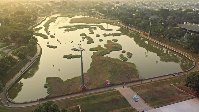 From a height, the miniature Indonesian islands in Taman Mini Indonesia Indah look like a living miniature map. 