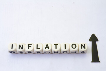 The word inflation along with an arrow pointing upwards isolated on a clear background with copy...