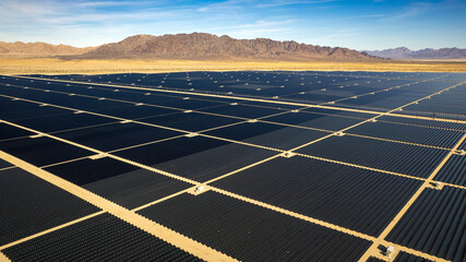Aerial view of solar power plant in the desert - obrazy, fototapety, plakaty