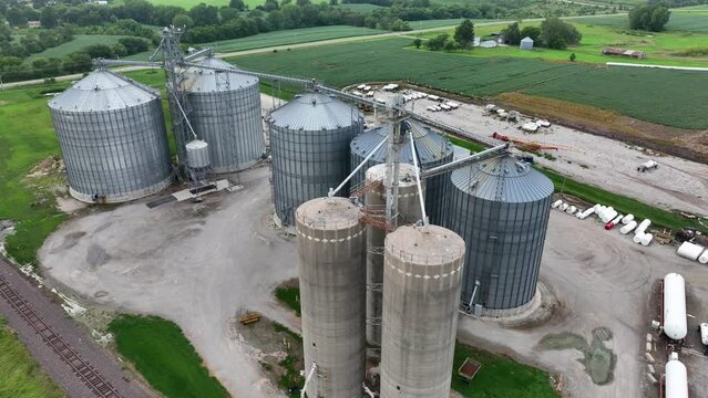 Grain elevator and ethanol plant in Kansas. High aerial orbit of midwest USA corn bin.