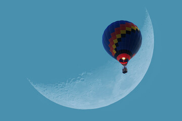 A balloon in the moon's background.