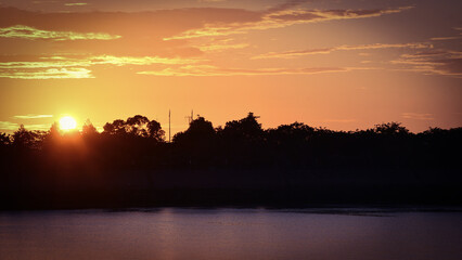 The Mekong riverbank with soft colors at has a pretty sunset in 16x9 dimensions in Phnom Penh in...