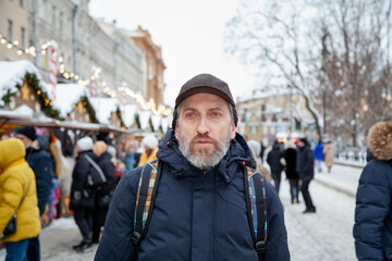 beard man at Christmas market looking for gifts....