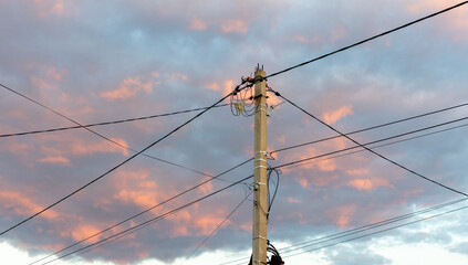 Electric pole against the sky