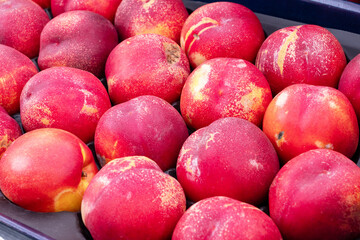 close up of organic peaches