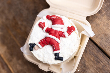 Funny Christmas cake. Merry Christmas to you. Happy Santa Claus. Delicious strawberry cake