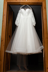 Fototapeta na wymiar The bride's wedding dress before the wedding ceremony.