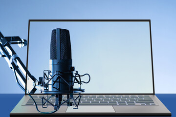 Microphone for podcasting. Laptop with blank screen. Professional microphone on tripod. Computer mock up. Dj laptop. Microphone for blogger. Sound recording equipment. Condenser mic. 