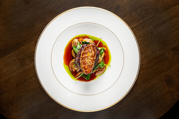 ribeye steak with potato and meat sauce