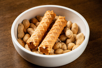 wafer rolls with milk, caramel and condensed chocolate