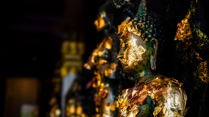 The side of the face of the golden Buddha