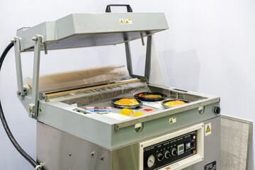 various goods such as cooked food and other on chamber of vacuum plastic film packing machine