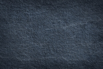 Dark grey stone or black slate background or texture