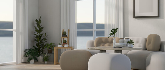 A modern living room with sofa poufs, a coffee table, houseplants, and window with sheer curtains.
