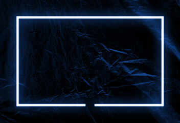 Dark plastic wall background, blue neon light and rectangle shape with horizontal banner.