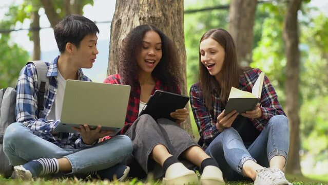 Group of students with books preparing for exams during holidays.