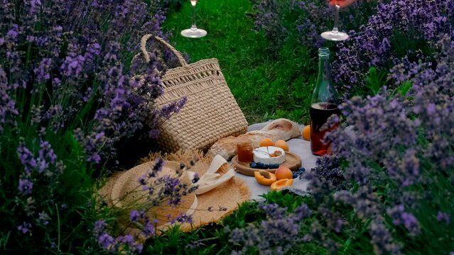 picnic in a lavender field with wine. Selective focus. nature.