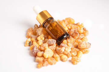 Frankincense or olibanum aromatic resin isolated on white background used in incense and perfumes.