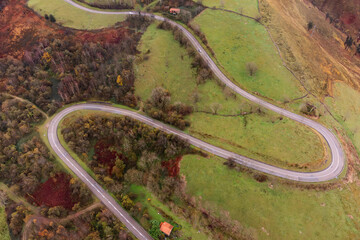 Aerial view of the road towards Alto del Caracol, in the Pasiegos valleys of Cantabria.
