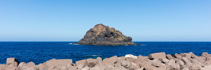 Fototapeta premium Panoramic image. Roque de Garachico in the north of Tenerife. Canary Islands. Spain