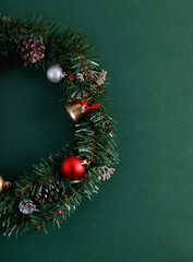 Christmas flowers and decorations on an isolated green background