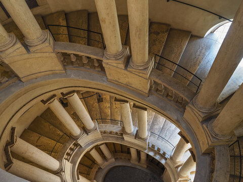 Interior of baroque Barberini Palace, National Gallery - Museum of Ancient Art. The famous small helicoidal, oval staircase by Borromini. Rome, Italy. 06 Mar 2019.