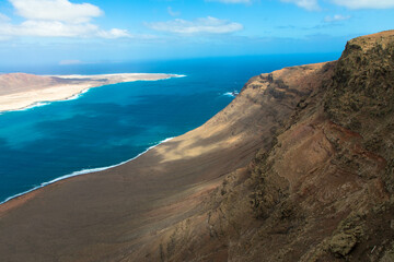 Obraz premium Spectacular Panorama view of the small island of La Graciosa. Seen from the Mirador del Rio on Lanzarote. Spain, Europe