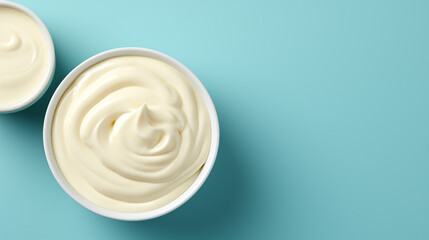 Bowl of tasty sour cream on wooden table