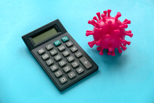 Concept between economic and pandemic virus. Calculator and virus model.